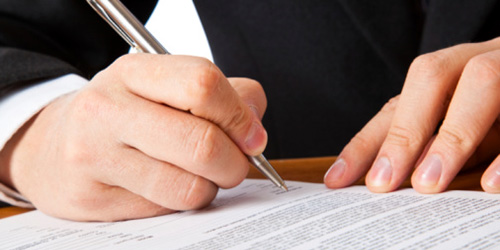 Lawyer writing on paper